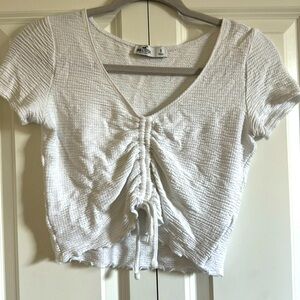 White Hollister singed crop top